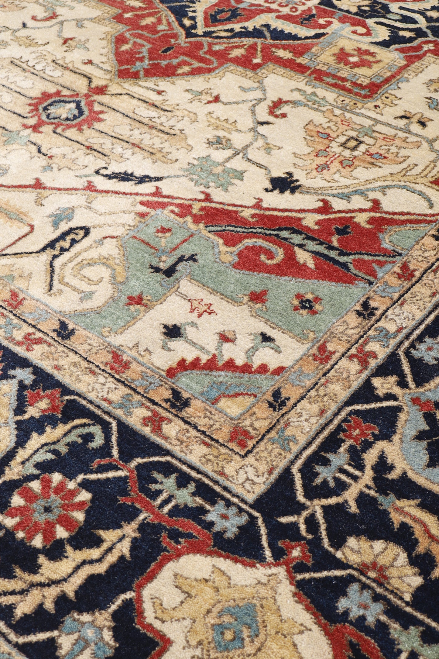 Magnificent Hand-Knotted Persian Inspired Heriz  Mugal Medallion Carpet with Traditional Floral and Geometric Motifs in Red, Navy, and Ivory