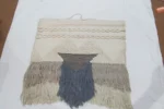 Handwoven Boho Wall Hanging – Textured Geometric Fringe Design