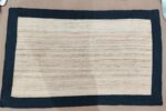 Handwoven Natural Jute Rug with Black Border - Image 4