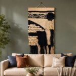 Black and cream abstract macrame wall hanging with moon motif and fringe
