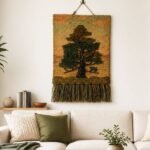 Handwoven pine tree wall hanging with dusty pink sky and fringe